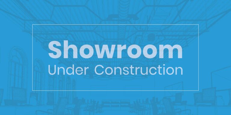 A 3d rendered image of a showroom with a blue overlay and text that reads "Showroom Under Construction"