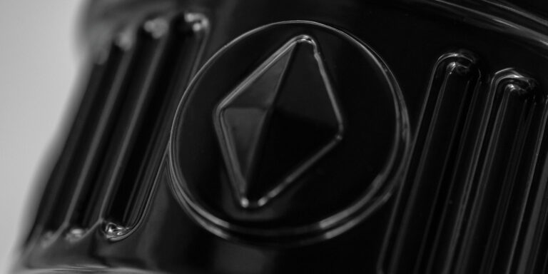 A close-up shot of a decorative pole base