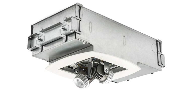 A detailed photo of a recessed emergency lighting system
